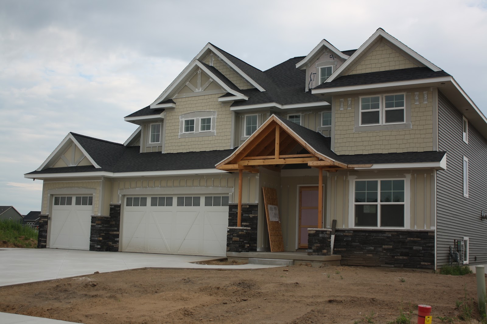 house colors ideas The Build: Exterior Stone, Siding, and Driveway Oh My!