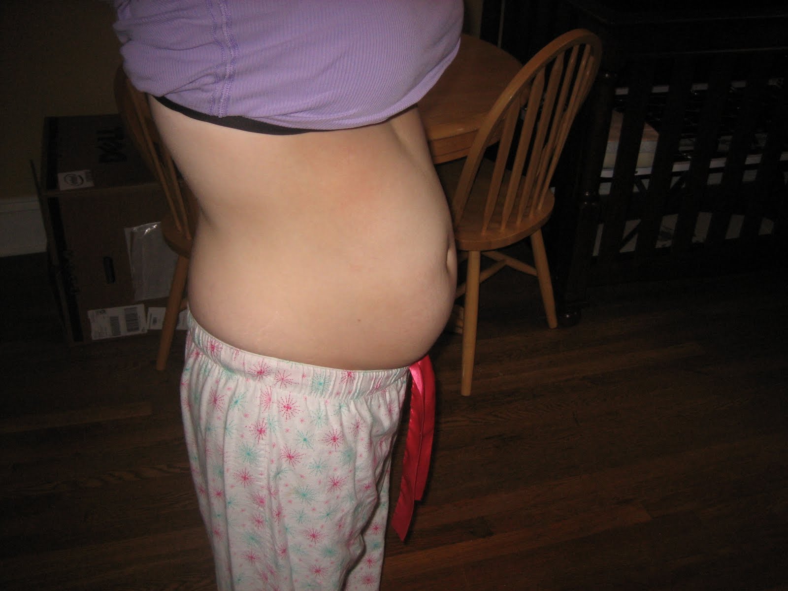 Pregnant Belly–21 weeks. I don't think I can see my toes anymore.