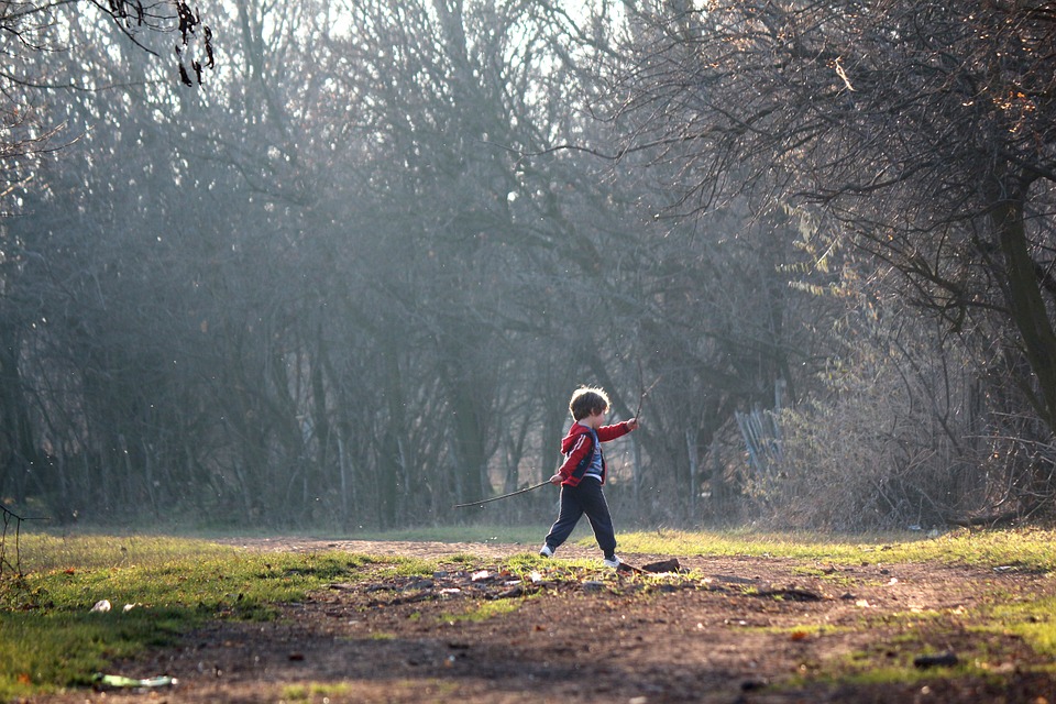 Small child moving in nature