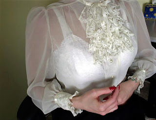 Sheer white vintage blouse worn over white vintage lingerie.