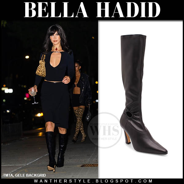 Bella Hadid in black cutout top, black skirt and black knee boots