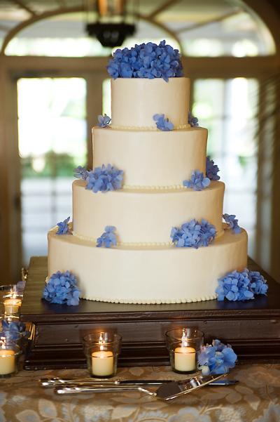 Blue hydrangeas and wide satin ribbon wedding cake
