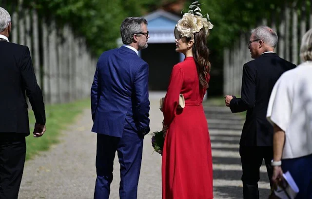 Crown Princess Mary wore a red Armonia silk georgette dress by Raquel Diniz. Crown Prince Frederik