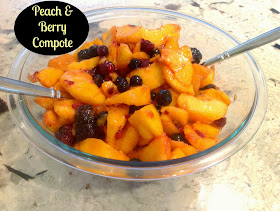 a bowl of peaches and berries