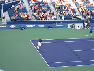 Andy Roddick returns.