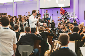 Toby Purser & the Orion Orchestra in a workshop with Acoustic machine created by Dyson Ltd. 