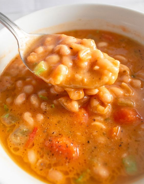 Fasolatha is a white bean and tomato soup with a nice and thick texture. All made from scratch using fresh ingredients.