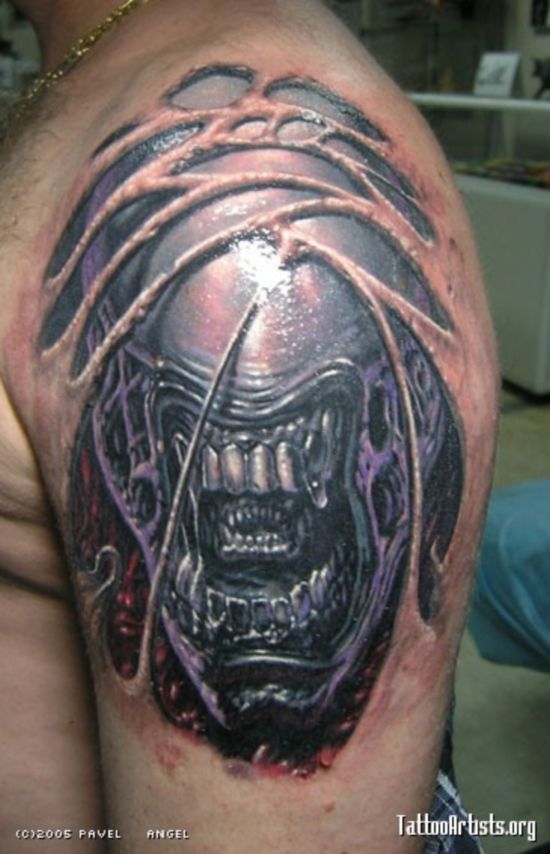 alien creature tattoo on the shoulder biomech tattoo alien creature