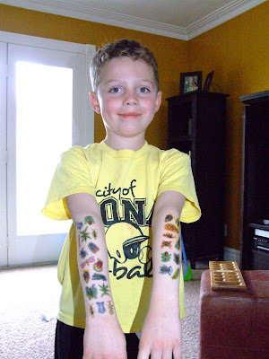 For Easter, my kids got some fake tattoos. Dylan decided he wanted "sleeves 