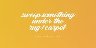 Sweep something under the rug/carpet artinya