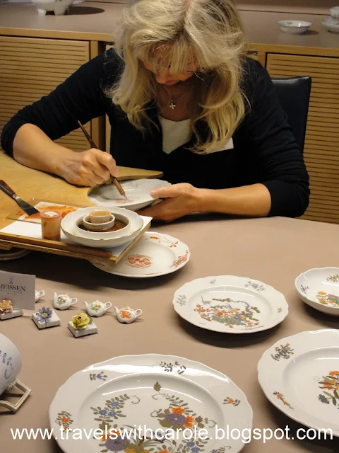 artist painting china at Meissen State Porcelain Manufactory in Meissen, Germany