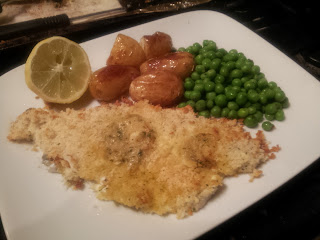Baked sea bass fillets topped with cream cheese and breadcrumbs