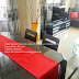 RED TABLE RUNNER DESIGNED, SOLD AND DELIVERED TO OUR CUSTOMER AT SINZA...