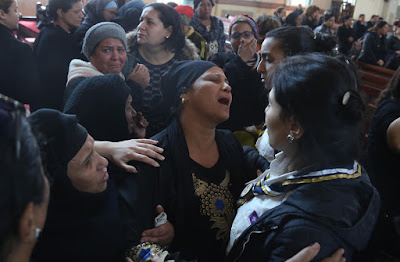 From the mass-funeral of the victims by Nader Nabil