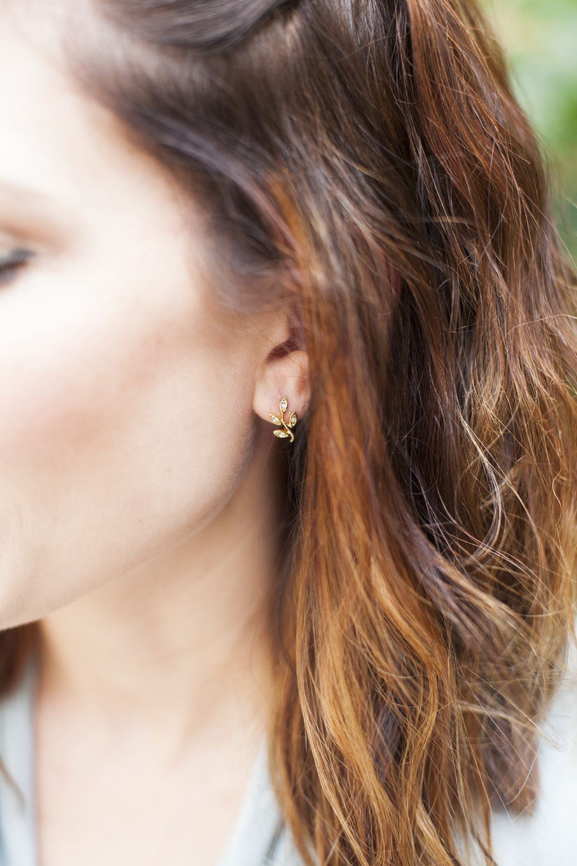 Amy West in earrings from Anthropologie