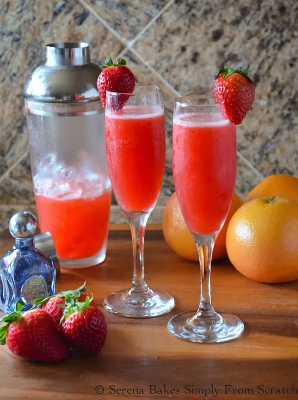 Strawberry Grapefruit Mimosas. The perfect drink for Valentines Day, Easter Brunch, or a summer gathering filled with strawberries, grapefruit, tequila and topped with champagne from Serena Bakes Simply From Scratch.