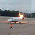 Photos: Commercial plane's engine catches fire at US airport