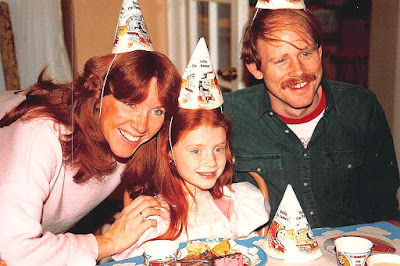 Bryce Dallas Howard with her parents in childhood birthday party