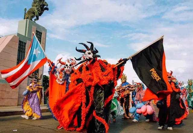 A man dressed as a demon in ponce carnival