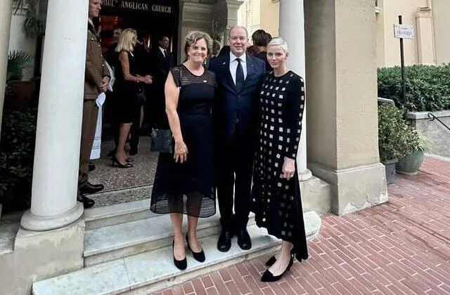 Princess Charlene wore a new square intarsia pattern knit dress by Akris. Dior leather pumps. Ambassador Menna Rawlings