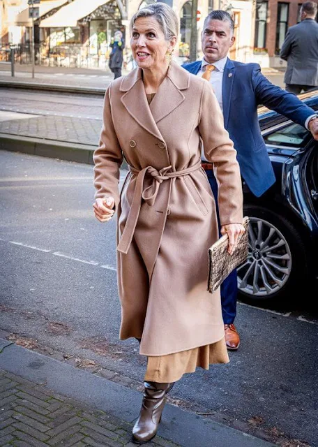 Queen Maxima wore a beige Madame wool coat by Max Mara, and Florinata midi dress by Zeus + Dione
