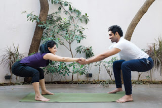 Chair Pose Yoga for Couple