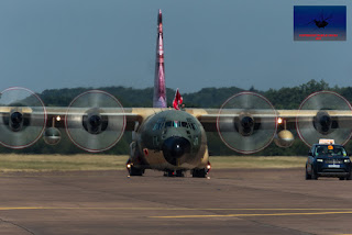 Royal Jordanian Airforce C-130H Taxiing behind Land Rover Discovery.