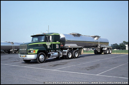 Mack CH600 pulling a tanker trailer owned by HR Ewell