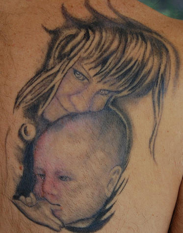 Baby girl tattoo.