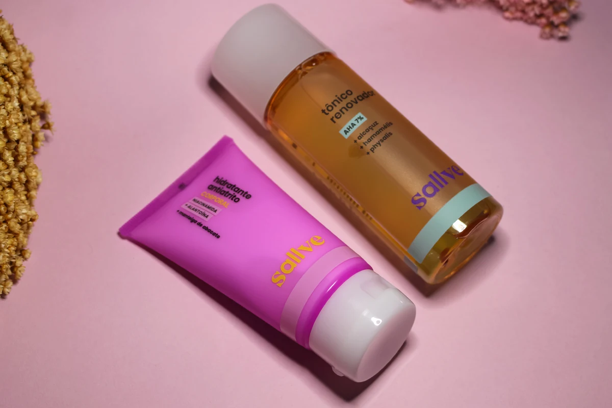 two skincare products by brand Sallve on a pink, studio's background