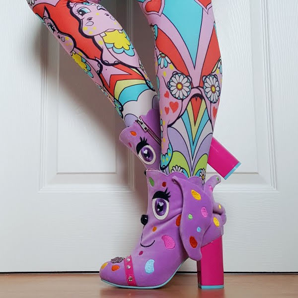 wearing bright pattern tights with lilac fur dog ankle boots