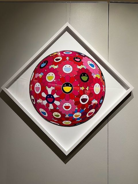 The Love Is An Art exhibition curated by street artist MegZany for Four Seasons West Lake Village's art gallery, with a piece by Takashi Murakami.
