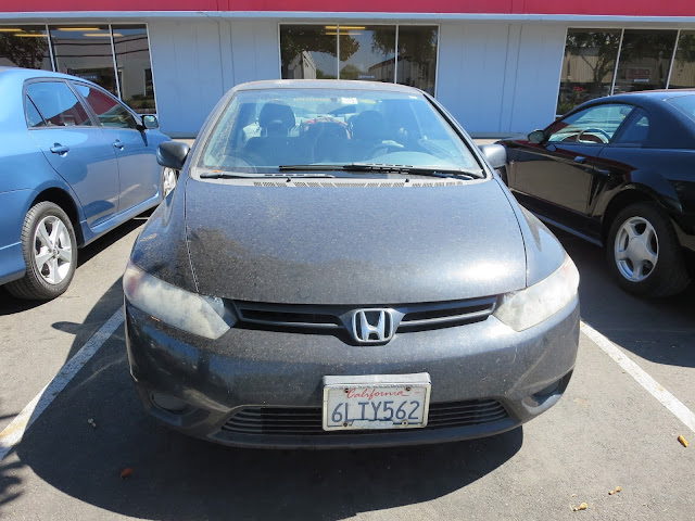 Dull looking Honda before getting new paint at Almost Everything Auto Body.