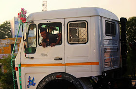 Truck cleaner smiling