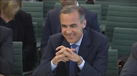 Governor of the Bank of England Mark Carney smiles as he gives evidence to members of parliament on the Treasury Committee on the July 5 Financial Stability Report, in London, Britain, in this still image taken from video July 12, 2016. (Credit: Reuters) Click to Enlarge.