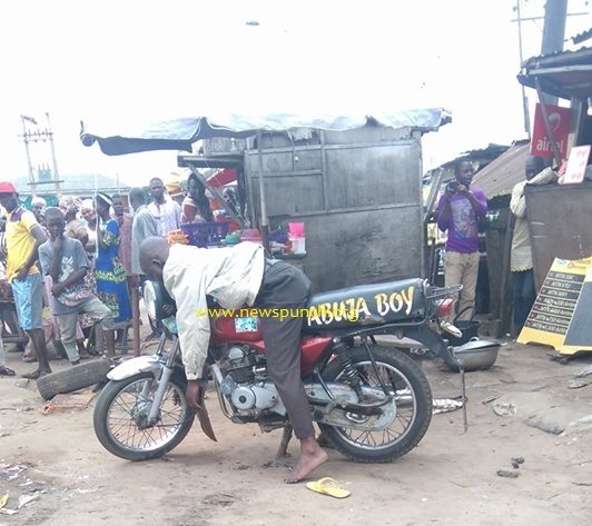 HAPPENING NOW: Sad!! As 'Abuja Boy', Okada Rider Slumps, Dies on Top of Own Okada In Badagry ...See Photos