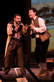 IN REVIEW: bass-baritone YURI KISSIN as Dulcamara (left) and tenor PAVEL SULIANDZIGA as Nemorino (right) in the Emerald Cast of Opera in Williamsburg's September 2021 production of Gaetano Donizetti's L'ELISIR D'AMORE [Photograph © by Diego Valdez; used with permission]