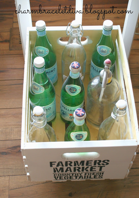 Vintage-inspired rolling pantry cart filled with Pellegrino bottles