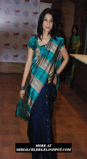 Anuja Iyer in low hip saree