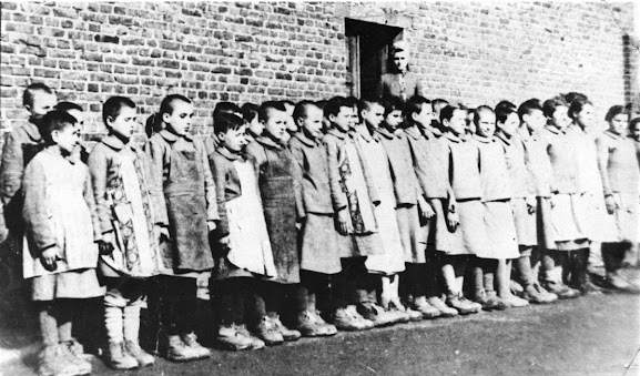 Germany Nazi Poland abuse children slave labour eugenics war crimes genocide