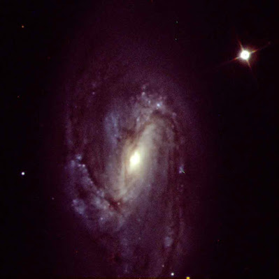 Color Image of M66 created using Adobe Photoshop