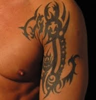 Tribal Tattoo Design on Male Upper Arm