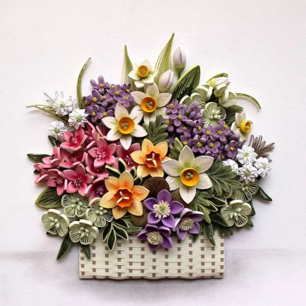multicolor quilled spring flowers in woven paper basket