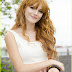 Bella Thorne Long Curly Hairstyle with Bangs