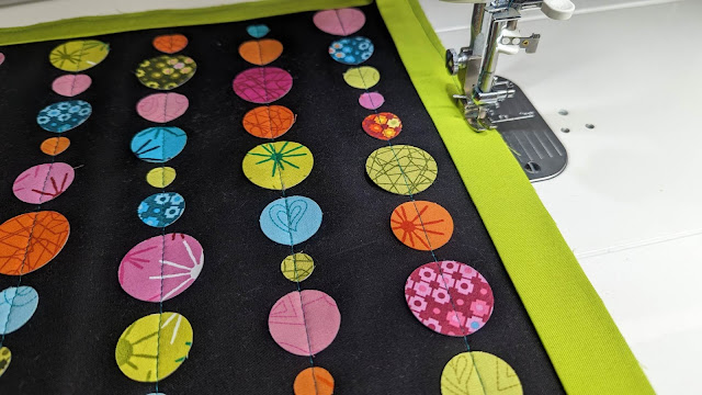 3-D applique circles made into an abacus quilt