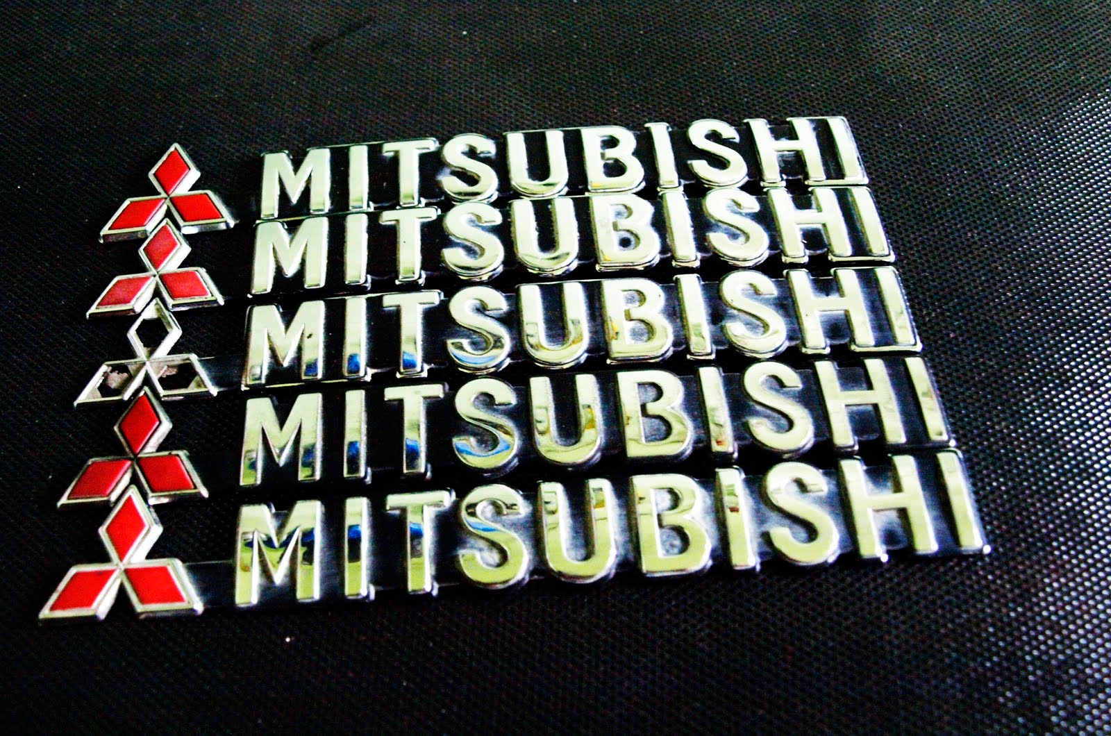 Used Mitsubishi Car Emblem. Original Mitsubishi Chrome Finish emblem . -halfcut item. -only few piece left. -self collect -x26gt; negotiable:)