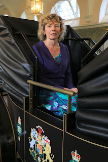 Rachel in the replica landau in the State Stables, Royal Mews, Buckingham Palace