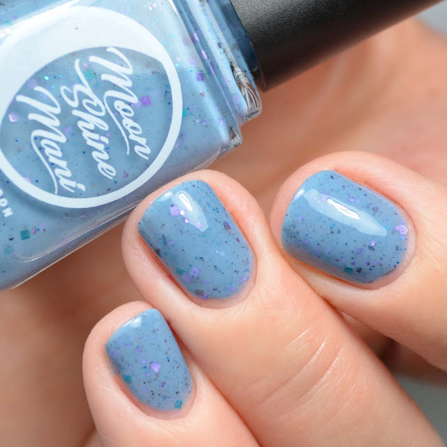 blue glitter nail polish swatch