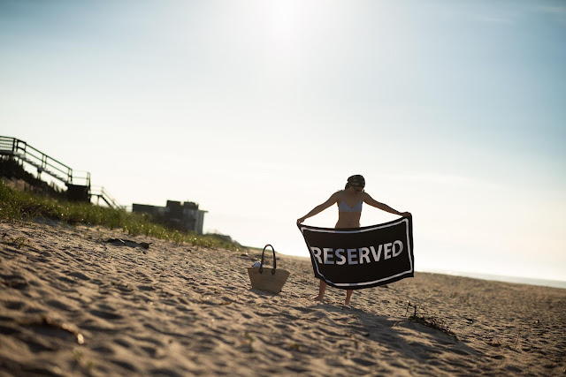 reserved beach towel, east coast beach style