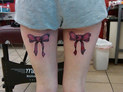 pink tattoo. Pink bows tattoo